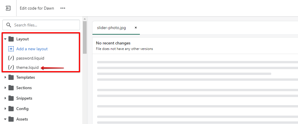In the Shopify code editor, click layout folder and then themes liquid file